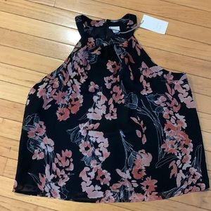 Women’s sleeveless high-neck top in black floral print size L— NWT